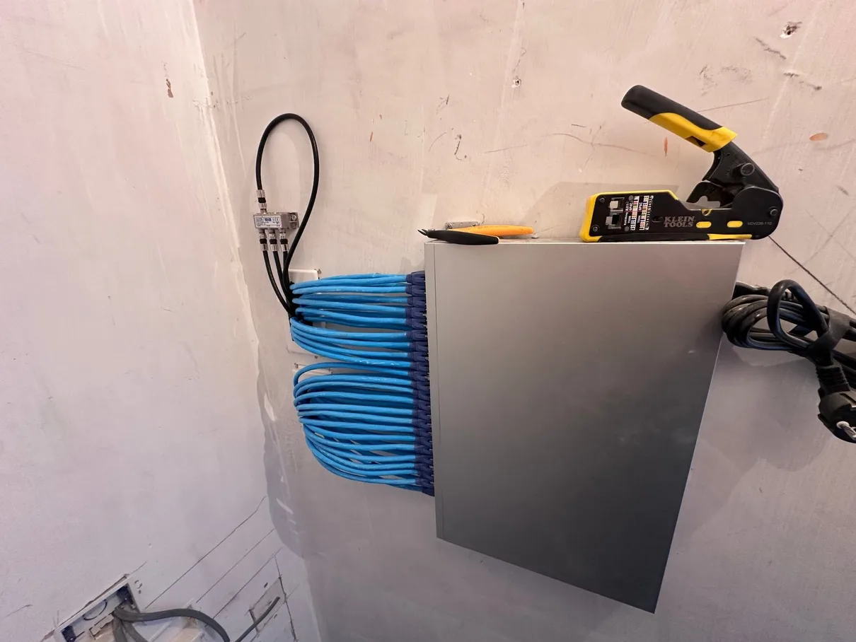 Network cabinet with CAT6 runs and TV aerial point — North London