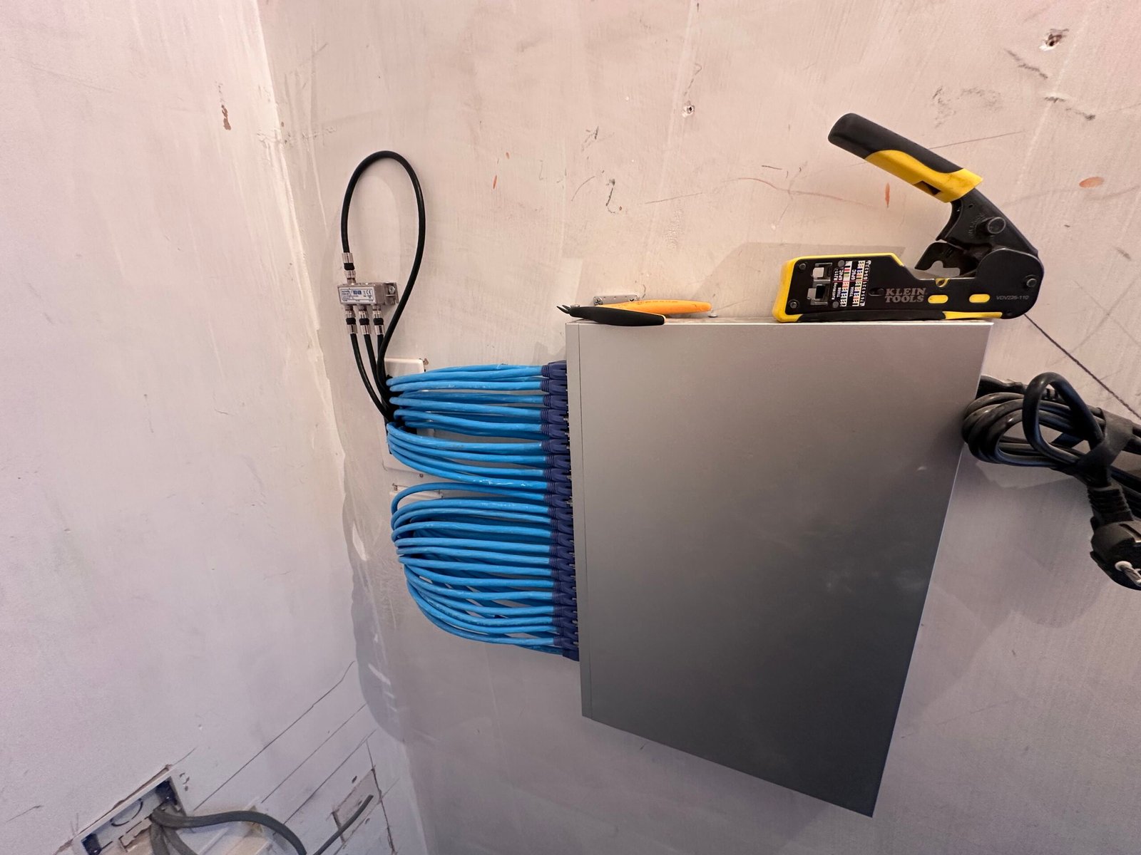 Network cabinet with CAT6 runs and TV aerial point — North London