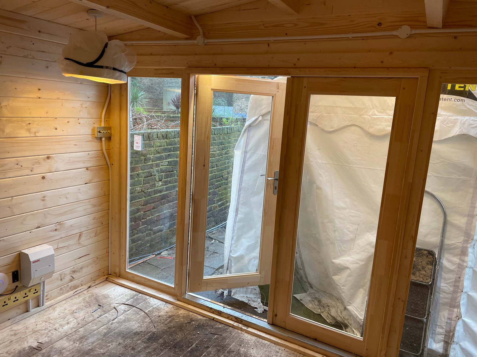 Ring video doorbell on brick wall — North London